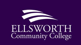 Coach Dale Stockdale at Ellsworth Community College with the team's tournament trophies