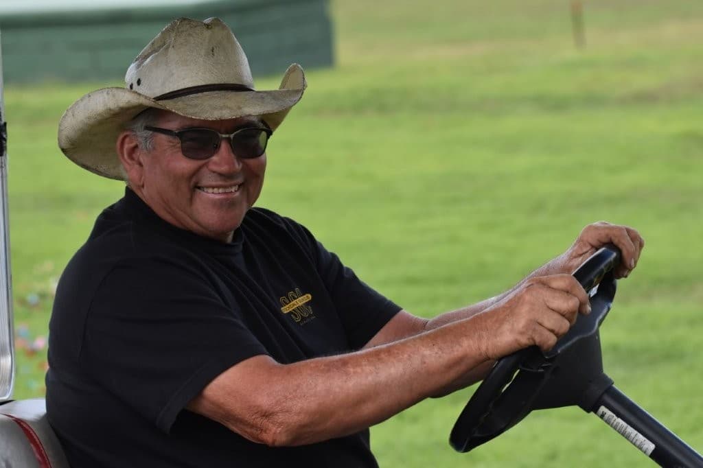 Dale Stockdale on the cart at the trap line