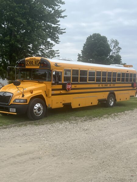 Buses rolled in early. Teams unloading for a long day on the line.