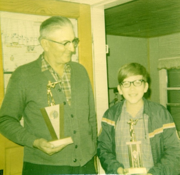 Merle Stockdale 1969 Singles Champion at the Cedar Falls Club shoot. 13 year old son, Dale Stockdale Junior Champion first trophy.